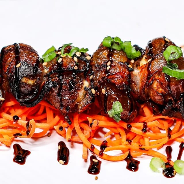 Bacon Wrapped Dates with Goat Cheese.
